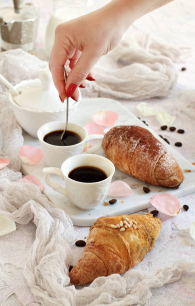 istock Breakfast with coffee and croissant 1097350554