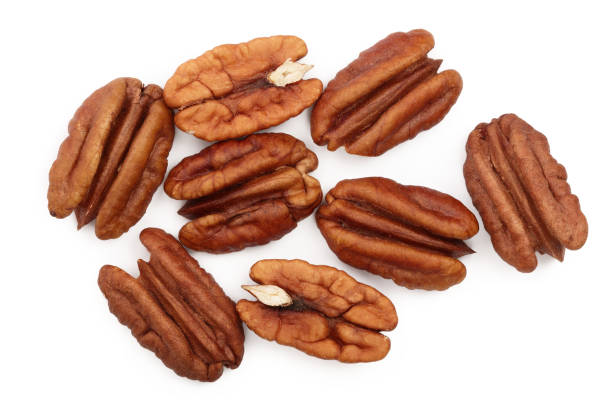 istock pecan nut isolated on white background. Top view. Flat lay 1097353270