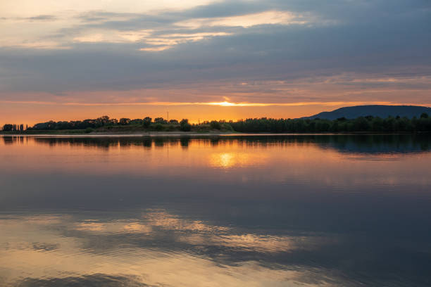 istock Sunset on a lake in Hohenrode in Germany 1097354204