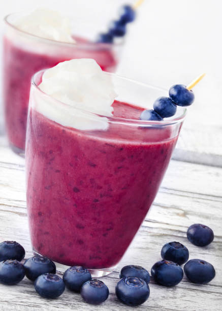 istock Glasses of blueberry smoothie 1097356102