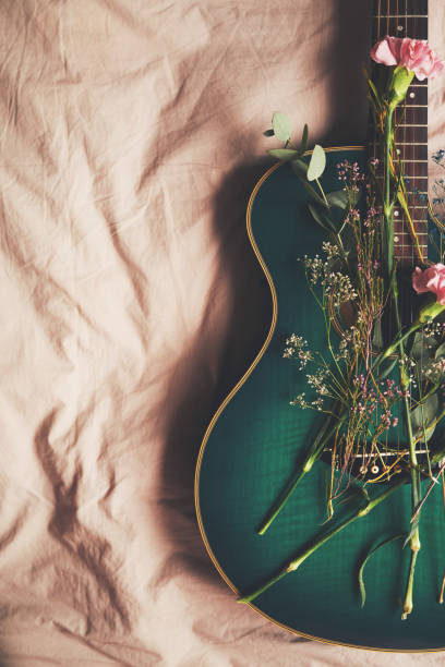 istock Green guitar fingers 1097356316