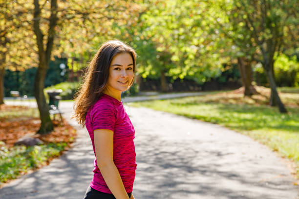istock Young woman exercising outdoor 1097360180
