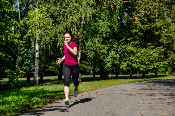 istock Young woman running outdoor 1097361078