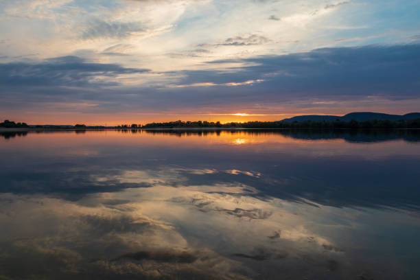 istock Sunset on a lake in Hohenrode in Germany 1097364324
