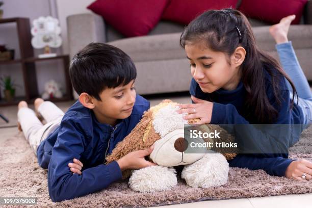Teddy Playing Children Playing With Teddy Bear Stock Photo - Download Image Now - 12 ...