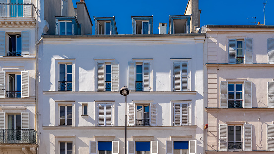 Montmartre, Paris, beautiful buildings, ancient facades with typical windows