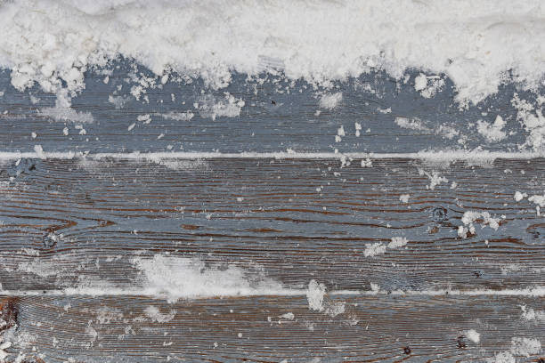 istock Frozen wooden boards in snow 1097376266
