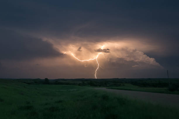 istock Lightning discharge from a severe thunderstorm in North Dakota 1097383852
