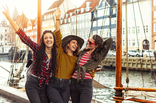 Group of happy girls in Nyhavn, Copenhagen