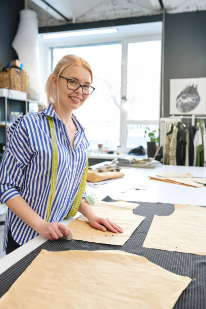 istock Female designer sewing dress 1097385896
