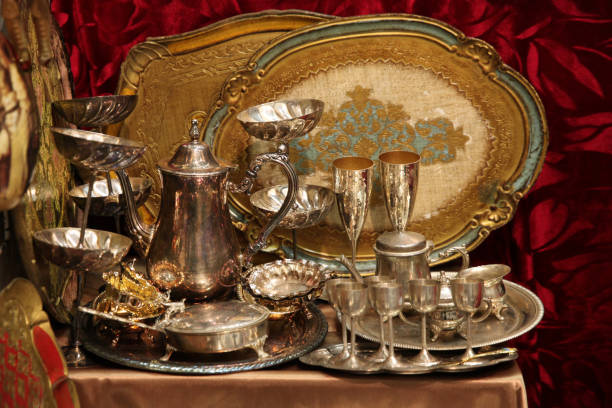 istock Vintage silverware, teapot, glasses on the table 1097388928
