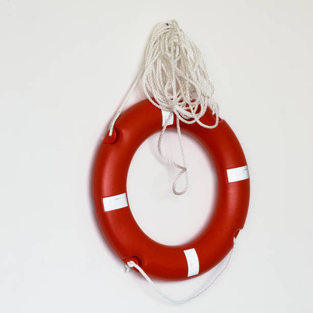 istock Red lifebuoy isolated over white background 1097399680