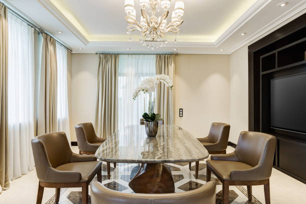 istock Wooden table and many chairs around. 1097402918