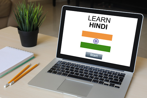 Learn Hindi language online e-learning computer software laptop desk