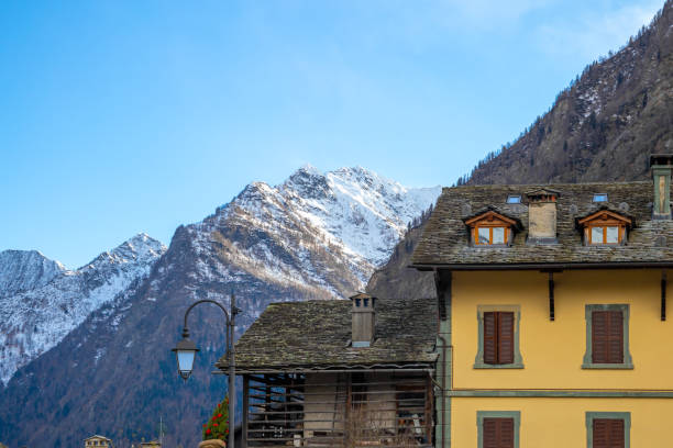 istock Mountain panorama with peaks, snow, villages, streams and trails 1097409374