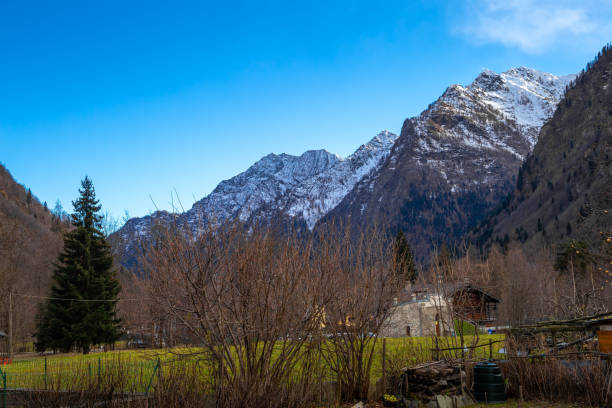istock Mountain panorama with peaks, snow, villages, streams and trails 1097409534
