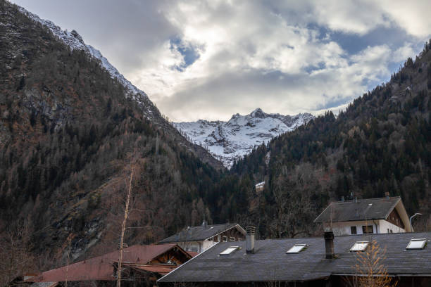 istock Mountain panorama with peaks, snow, villages, streams and trails 1097409702
