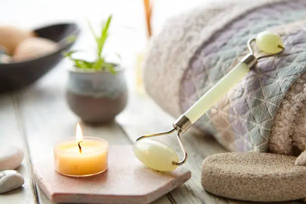 Facial Treatment Jade Stone Roller In Spa Setting
