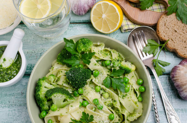 istock Traditional Italian pasta with green vegetables 1097415186