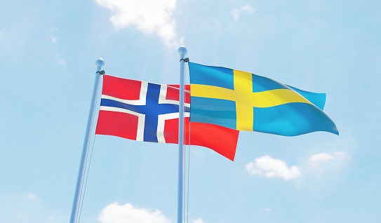 Sweden and Norway, two flags waving against blue sky. 3d image