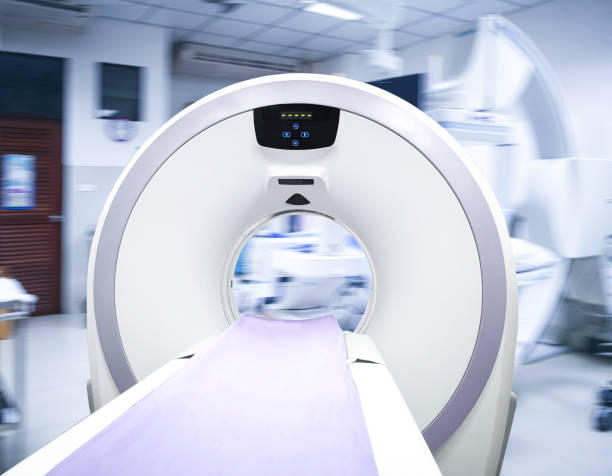 istock CT Scanner ( Computed Tomography ) isolated on motion blurred CT Scan room background.  front view. Clipping path. 1097423214