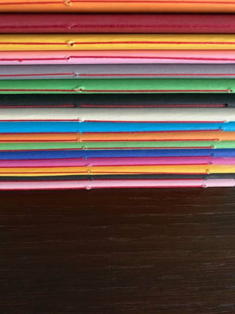 istock Row of colorful diaries 1097423828