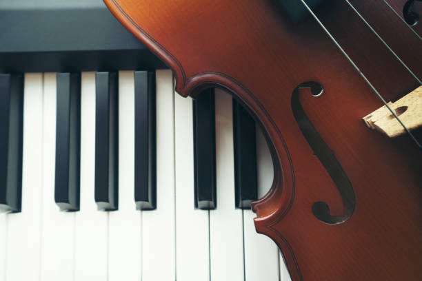 istock Piano keyboard with violin,top view 1097424432