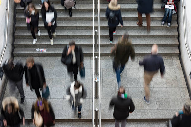 istock People walking up and down the stairs 1097426922