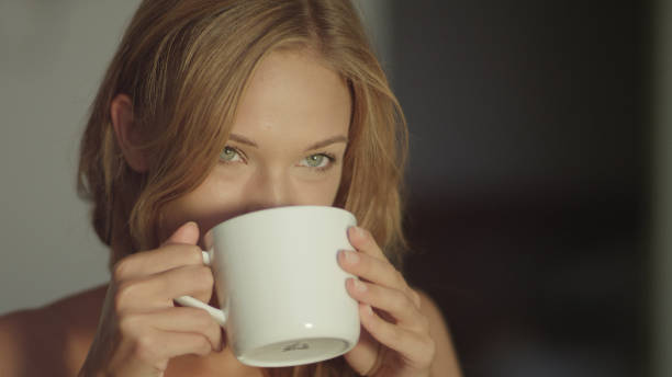 istock Beautiful girl having breakfast. Morning coffee 1097428070