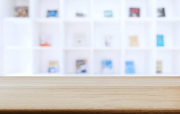 istock Selected focus empty old wooden table and Library or Bookstore blur background with bokeh image. for your photomontage or product display 1097428998