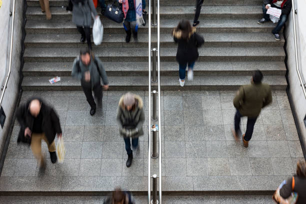 istock People walking up and down the stairs 1097431990