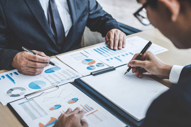 istock Finance manager meeting discussing company growth project success financial statistics, professional investor working start up project for strategy plan with document, laptop and digital tablet 1097432252