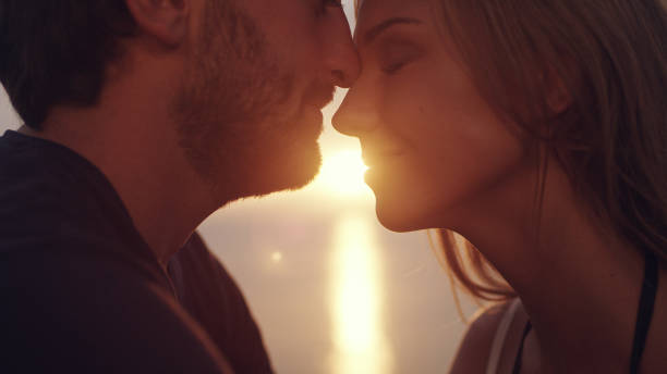 istock Romantic date on a cliff. Waiting for sunset 1097432312
