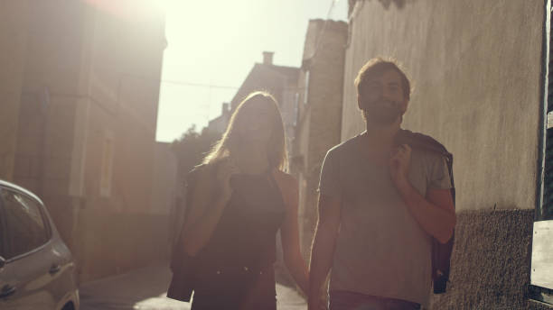 istock Happy couple walking on street 1097432916