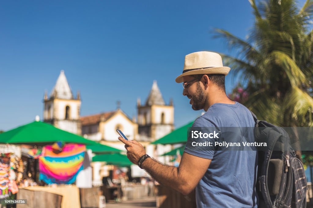Tourist in Olinda, Pernambuco Global Positioning System, Smart Phone, Map, Using Phone, Hand, Travel Stock Photo