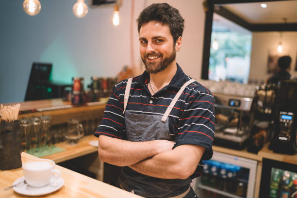 istock Barista in coffee shop 1097436130