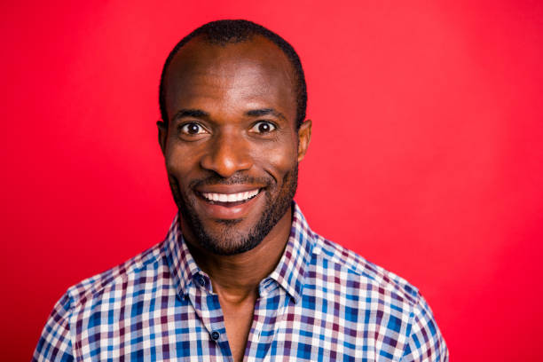 istock Close-up portrait of nice handsome attractive cheerful cheery optimistic guy wearing checked shirt isolated over bright vivid red background 1097436322