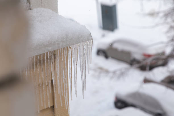 istock icicles on the facade of a close-up 1097438088