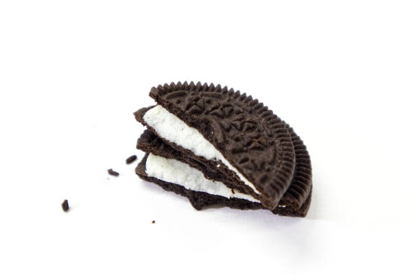 istock Close up section view cookie and cream isolated on white background. 1097439040