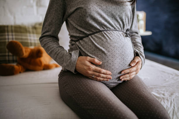 istock Happy pregnant woman expecting babies 1097442412