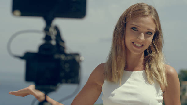 istock Female vlogger on vacation 1097443912