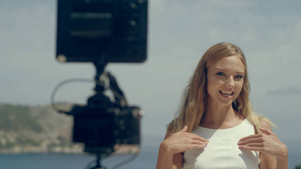 istock Female vlogger on vacation 1097443920