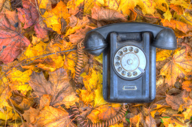 istock old broken phone on the autumn street HDR 1097451560