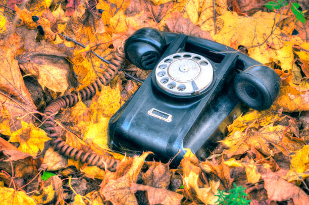 istock old broken phone on the autumn street HDR 1097451564
