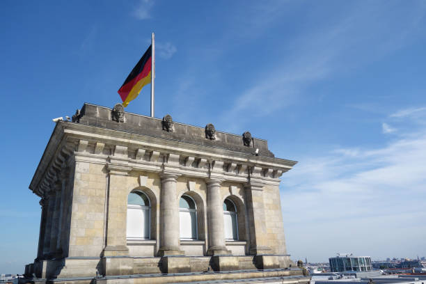 istock The Reichstag with German flag 1097452436
