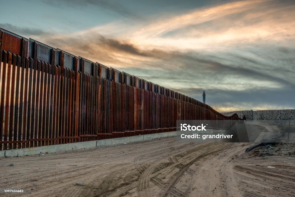 The United States Mexico International Border Wall between Sunland Park New Mexico and Puerto Anapra, Chihuahua Mexico The iconic and controversial iron border wall between the USA and Mexico International Border Barrier Stock Photo