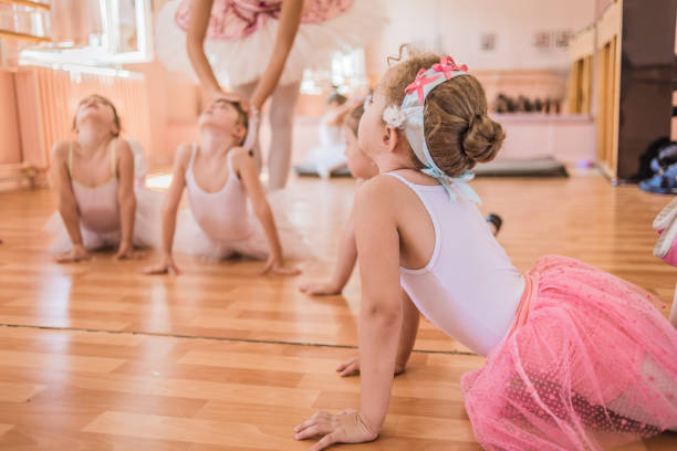 istock group of young ballerinas on practice 1097455432