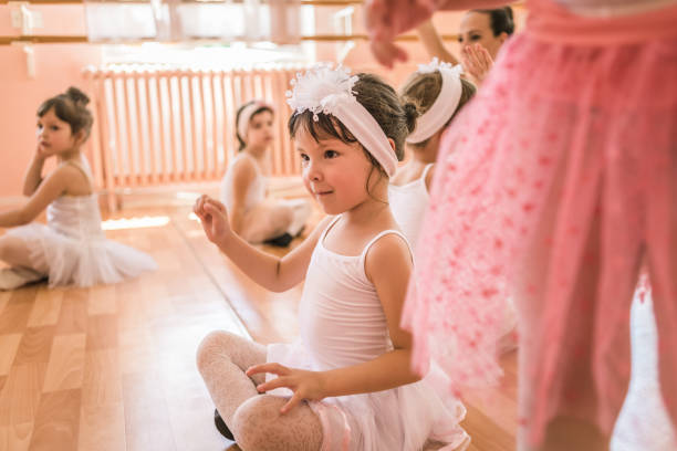 istock group of young ballerinas on practice 1097458046