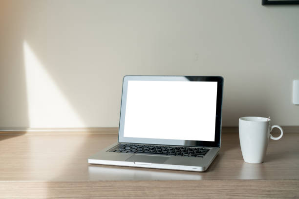 istock Laptop on a desk with lamp 1097459154