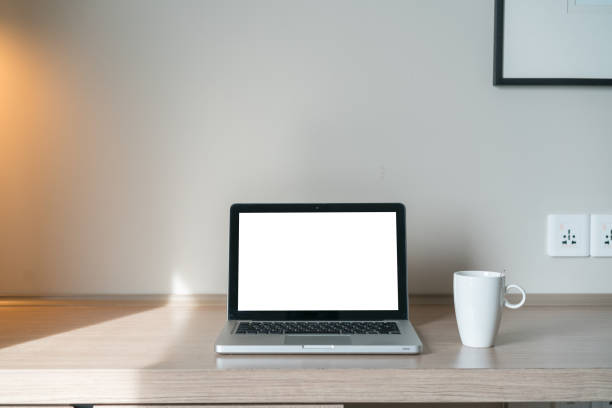 istock Laptop on a desk with lamp 1097459184